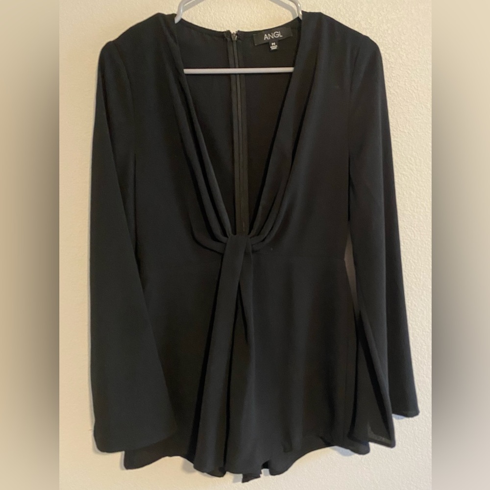 Romper. Very cute. Worn once